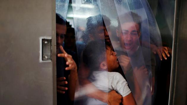 Relatives of a Palestinian, who was killed at the Israel-Gaza border, react at a hospital in Gaza City June 18, 2018. (Reuters Photo) Relatives of a Palestinian, who was killed at the Israel-Gaza border, react at a hospital in Gaza City June 18, 2018. (Reuters Photo)