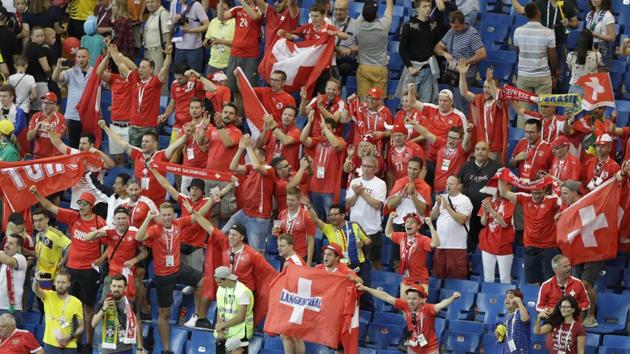 Swishers fans celebrate after the group E match between Brazil and Switzerland. (AP)