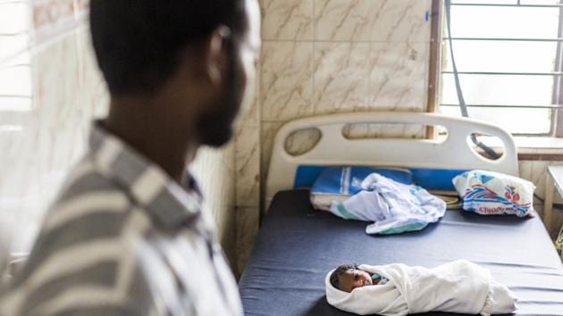 A newly born child, just three hours old, and his father, 28-year-old N Jyothi meet each other for the first time in their lives at the Post Natal Ward of the Nandivaram Primary Health Care Centre, Chennai on June 12, 2018. (Prashanth Vishwanathan / UNICEF) A newly born child, just three hours old, and his father, 28-year-old N Jyothi meet each other for the first time in their lives at the Post Natal Ward of the Nandivaram Primary Health Care Centre, Chennai on June 12, 2018. (Prashanth Vishwanathan / UNICEF)