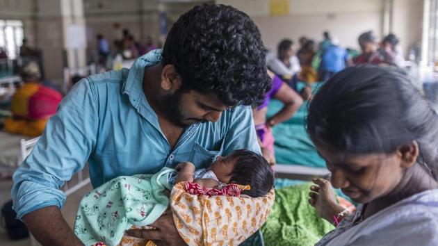 27-year-old Rajkamal described it as “a great feeling,” as he took his three day old child into his arms for the first time, from his wife Kalairasa at the Post Natal Ward of the Institute Of Obstetrics And Gynaecology And Govt. Hospital For Women And Children, in Egmore, Chennai on June 11, 2018. (Prashanth Vishwanathan / UNICEF) 27-year-old Rajkamal described it as “a great feeling,” as he took his three day old child into his arms for the first time, from his wife Kalairasa at the Post Natal Ward of the Institute Of Obstetrics And Gynaecology And Govt. Hospital For Women And Children, in Egmore, Chennai on June 11, 2018. (Prashanth Vishwanathan / UNICEF)