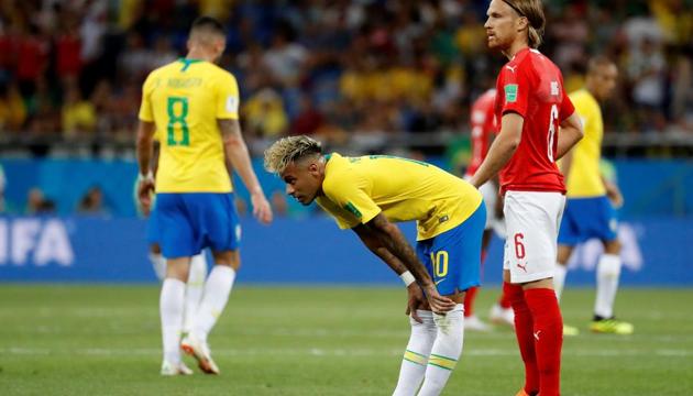 Brazil's Neymar looks dejected as Switzerland's Michael Lang looks on at the end of the Group E match at the FIFA World Cup 2018. (REUTERS)