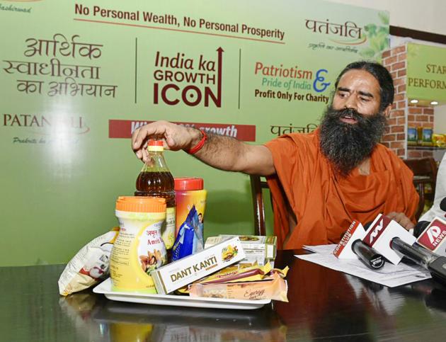 Chief minister Yogi Adityanath had called up Ramdev (pictured here) and Patanjali Group CEO Acharya Balakrishna personally to assure them of all possible help and co-operation.(Arvind Ashok Nigam/ Hindustan Times)
