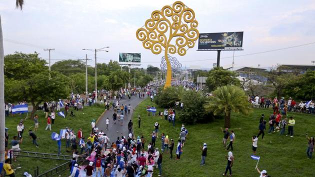 One of the main targets have been Murillo’s “Chayopalos,” or Trees of Life, that spouted up in 2013 — huge steel sculptures of trees covered with hundreds of light bulbs lining the capital’s major thoroughfares. The administration portrayed them as public art installations, but many saw them as a gaudy extravagance in a country rife with poverty. (Esteban Felix / AP)