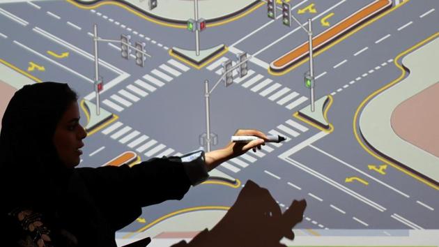 An instructor teaches road signs at the Saudi Aramco Driving Center. “I would like to control every single detail of my trip. I will be the one to decide when to go, what to do, and when I will come back,” Abdulgader said. (Ahmed Jadallah / REUTERS) 