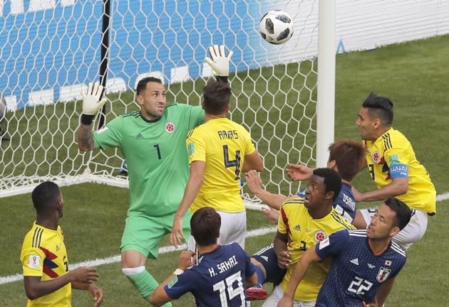 Japan's Yuya Osako, center right, scores his side second goal during the group H match between Colombia and Japan at the 2018 soccer World Cup. (AP) Japan's Yuya Osako, center right, scores his side second goal during the group H match between Colombia and Japan at the 2018 soccer World Cup. (AP)