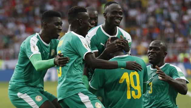 Senegal's Mbaye Niang (#19) celebrates with his teammates scoring his side's second goal during the group H match between Poland and Senegal at the FIFA World Cup 2018 in the Spartak Stadium in Moscow, Russia on June 19, 2018.(AP)