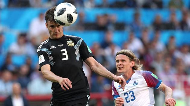 Argentina's Nicolas Tagliafico in action with Iceland's Ari Freyr Skulason at FIFA World Cup 2018.(REUTERS)