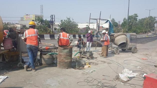 Repair work being carried out on Gill flyover in Ludhiana. (HT Photo) Repair work being carried out on Gill flyover in Ludhiana. (HT Photo)