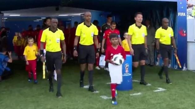 Rishi Tej (centre with the ball) became the first ever official match ball carrier from India at FIFA World Cup 2018, during the Group G match between Belgium and Panama earlier this week.(Twitter)