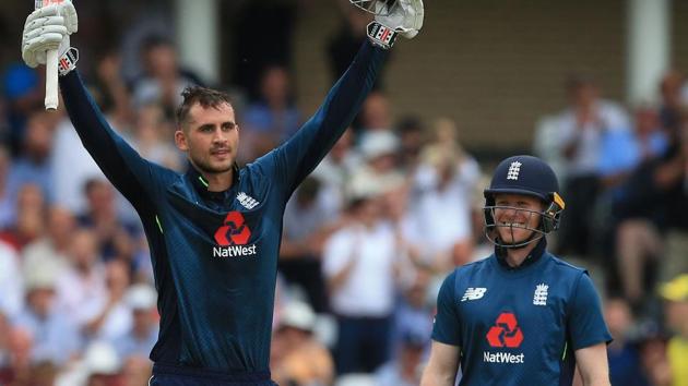 England's Alex Hales (L) celebrates his century as England's Eoin Morgan looks on during the third ODI encounter against Australia at Trent Bridge on Tuesday.(AFP)