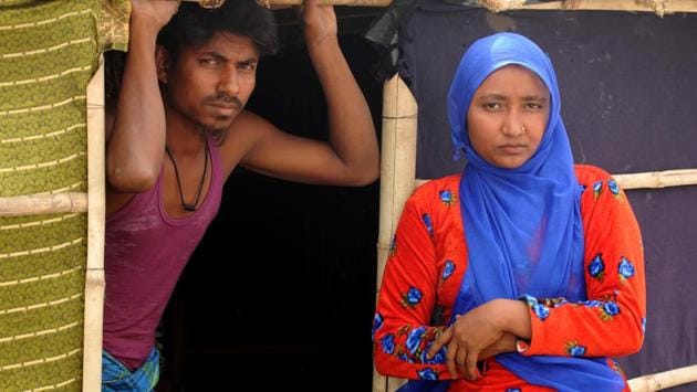 More than 46 km away from Gurugram, Chandeni hosts three camps. Last month, a fire damaged 57 dwellings in Chandeni camp 1. Mohd. Jawed, 34, was among those who lost all their belongings in the fire. He lost all documents that established his identity in India along with three lakh in cash. Now he and his wife are trying to build a temporary hut before the monsoon sets in. (Parveen Kumar / HT Photo) More than 46 km away from Gurugram, Chandeni hosts three camps. Last month, a fire damaged 57 dwellings in Chandeni camp 1. Mohd. Jawed, 34, was among those who lost all their belongings in the fire. He lost all documents that established his identity in India along with three lakh in cash. Now he and his wife are trying to build a temporary hut before the monsoon sets in. (Parveen Kumar / HT Photo)