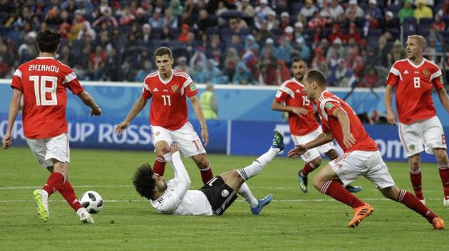 Mohamed Salah is fouled in the penalty box during the group A match between Russia and Egypt at the FIFA World Cup 2018 in the St. Petersburg Stadium.(AP)