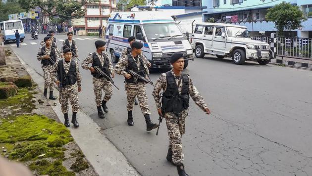 Security personnel patrol a street during curfew after clashes between the residents of the city's Punjabi Line area and Khasi drivers of state-run buses, in Shillong on June 4. (PTI Photo) Security personnel patrol a street during curfew after clashes between the residents of the city's Punjabi Line area and Khasi drivers of state-run buses, in Shillong on June 4. (PTI Photo)