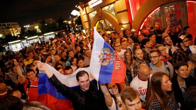 Fans celebrate on the streets after Russia beat Egypt in the FIFA World Cup 2018 on Tuesday. (Reuters) Fans celebrate on the streets after Russia beat Egypt in the FIFA World Cup 2018 on Tuesday. (Reuters)