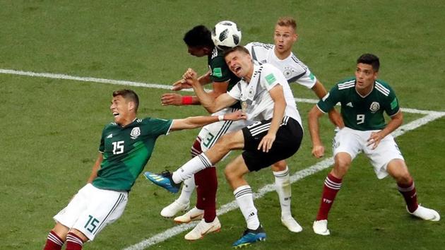 Germany's Thomas Muller and Joshua Kimmich in action with Mexico's Hector Moreno, Raul Jimenez and Jesus Gallardo at Soccer at Luzhniki Stadium, Moscow, on June 17.(REUTERS)