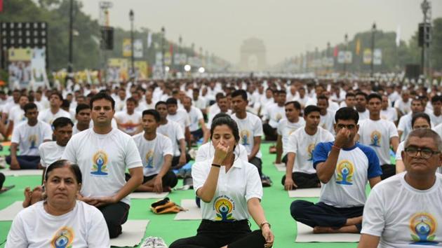 Early risers in New Delhi gathered to celebrate the fourth International Yoga Day at Rajpath near India Gate. (Arvind Yadav / HT Photo) Early risers in New Delhi gathered to celebrate the fourth International Yoga Day at Rajpath near India Gate. (Arvind Yadav / HT Photo)