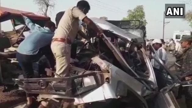 Policemen retrieving the bodies from the crushed jeep in Morena. (ANI) Policemen retrieving the bodies from the crushed jeep in Morena. (ANI)