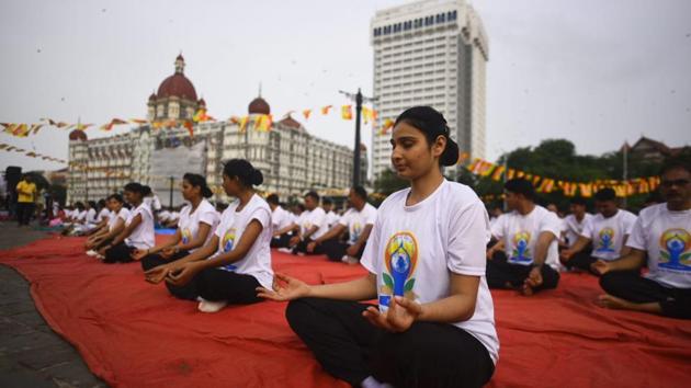 A yoga session at Gateway of India in Mumbai. The United Nations General Assembly declared June 21 as the International Day of Yoga in December 2014. Over 190 countries, supported the move to have a special day for yoga. (Pratik Chorge / HT Photo) A yoga session at Gateway of India in Mumbai. The United Nations General Assembly declared June 21 as the International Day of Yoga in December 2014. Over 190 countries, supported the move to have a special day for yoga. (Pratik Chorge / HT Photo)