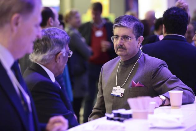 Uday Kotak, billionaire and chairman of Kotak Mahindra Bank Ltd., right, speaks to an attendee ahead of the World Economic Forum (WEF) in Davos, Switzerland, on Monday, Jan. 22, 2018.(Simon Dawson/Bloomberg) Uday Kotak, billionaire and chairman of Kotak Mahindra Bank Ltd., right, speaks to an attendee ahead of the World Economic Forum (WEF) in Davos, Switzerland, on Monday, Jan. 22, 2018.(Simon Dawson/Bloomberg)