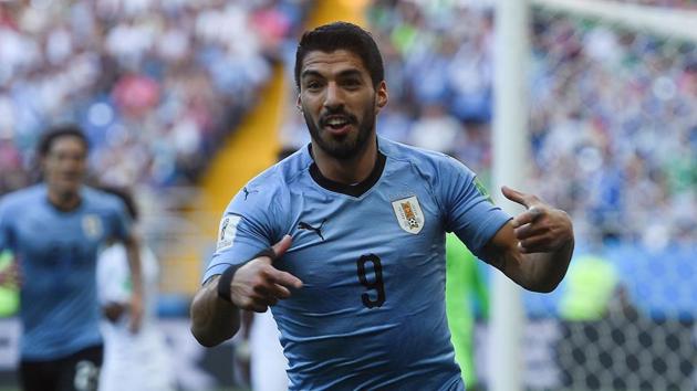 Suarez sends Uruguay into last 16 with hosts Russia