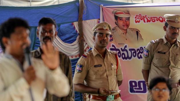 A banner with Rajeshwari’s image is displayed during a fake news awareness event in Balgera village. “You see these messages, these photos and videos, but you don’t check if they’re real or fake, you just forward them,” Rajeshwari told them. “Don’t spread these messages. And when strangers come to your village, don’t take the law into your hands. Don’t kill them.” (Dhiraj Singh / Bloomberg)