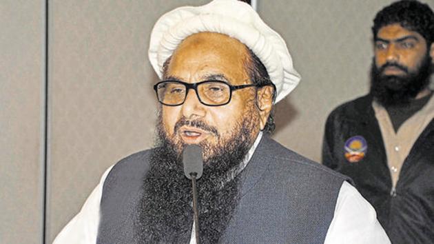Mumbai-terror attack mastermind Hafiz Saeed’s son and his son-in-law are among 265 candidates fielded by the JuD for contesting Pakistan general elections.(AP File Photo) Mumbai-terror attack mastermind Hafiz Saeed’s son and his son-in-law are among 265 candidates fielded by the JuD for contesting Pakistan general elections.(AP File Photo)