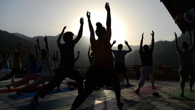 International Yoga Day, was proposed by Prime Minister Narendra Modi in 2014 to the UN General Assembly and adopted unanimously. “Imagine that! The prime minister went to the United Nations and talked about the benefits of yoga... Today yoga is everywhere,” Saraswati told AFP at his Parmarth Niketan Ashram, a stone’s throw from the river Ganga. (Sajjad Hussain / AFP)