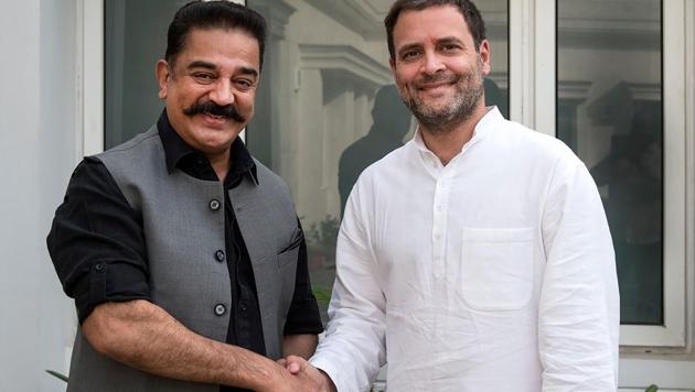 This handout photograph released by AICC Communication Deptartment on June 20, 2018 shows s Congress president Rahul Gandhi shaking hands with Kamal Haasan in New Delhi. (AFP/AICC) This handout photograph released by AICC Communication Deptartment on June 20, 2018 shows s Congress president Rahul Gandhi shaking hands with Kamal Haasan in New Delhi. (AFP/AICC)