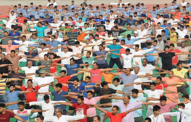 People perform yoga to mark the 4th International Day of Yoga, in Patna, Bihar.(HT Photo/A P Dube)