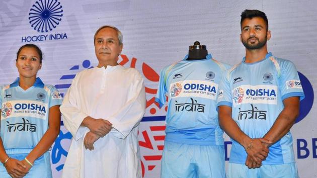 Odisha chief minister Naveen Patnaik with the skippers of Indian men's and women's hockey teams Rani Rampal and Manpreet Singh at a function in New Delhi on February 15. Odisha will sponsor the national men's and women's hockey teams for the next five years.(PTI File Photo)