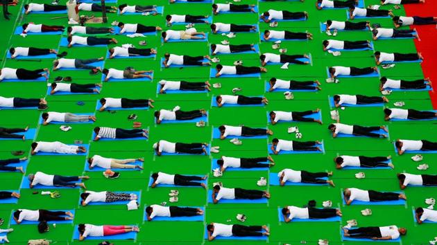 Chandigarh was lined with yoga mats as enthusiasts and yoga practitioners swarmed to mark the day. (Ajay Verma / REUTERS) Chandigarh was lined with yoga mats as enthusiasts and yoga practitioners swarmed to mark the day. (Ajay Verma / REUTERS)
