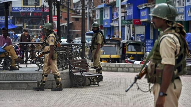 Security personnel stand guard at Lal Chowk in Srinagar, on June 19, 2018. (PTI) Security personnel stand guard at Lal Chowk in Srinagar, on June 19, 2018. (PTI)