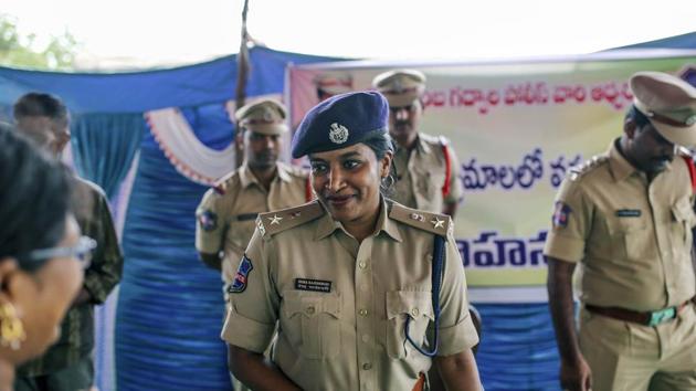 IPS officer Rema Rajeshwari interacts with people during a public awareness programme for fake news via social media apps in Balgera village in Gadwal district of Telangana.(Dhiraj Singh/ Bloomberg)