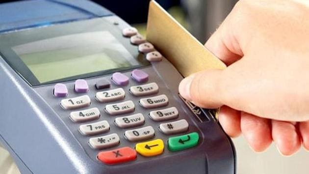 The police have seized 51 swiping machines, 65 duplicate credit and debit cards, card readers and several cheque books from the accused.(HT File Photo)