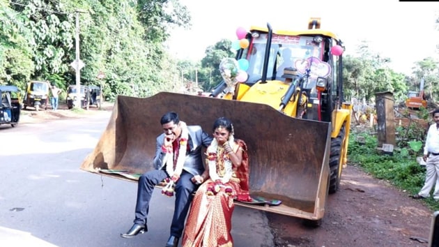Couple took a ride on a JCB after their wedding (ANI)