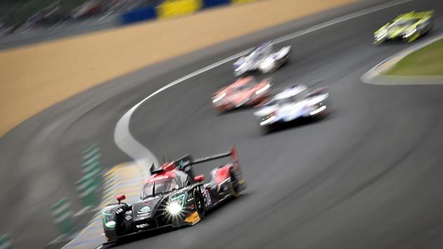 Ligier JSP217 Gibson US’ driver Ricky Taylor (L) competes during the 86th edition of the 24h du Mans car endurance race in Le Mans, western France. (Loic Venance / AFP)