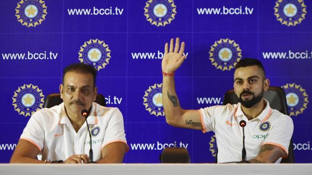 Indian cricket team captain Virat Kohli, right, and head coach Ravi Shastri address the media ahead of the team’s travel to England and Ireland on Friday.(Vipin Kumar / HT Photo)