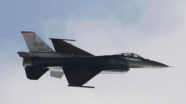 This file photo taken on February 14, 2017 shows a Lockheed Martin F-16 fighter aircraft from the US Air Force performing an aerial display over the skies of Yelahanka Air Force Station on the inaugural day of the 11th edition of Aero India, a biennial air show and aviation exhibition, in Bangalore.(AFP)