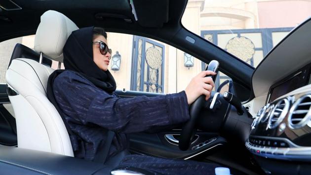 (FILES) In this file photo taken on April 29, 2018, a Saudi woman practices driving in Riyadh, ahead of the lifting of a ban on women driving in Saudi Arabia in the summer.(AFP File Photo)