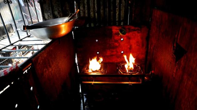 Flames are seen from an LPG stove in the kitchen of a resident at Vitas Tenement, a government housing building, in Tondo, Manila. Faulty electrical connections, often dangerously rigged and overloaded by residents, unattended stoves and carelessly tossed cigarettes are the main causes of the fires. (Erik De Castro / REUTERS) Flames are seen from an LPG stove in the kitchen of a resident at Vitas Tenement, a government housing building, in Tondo, Manila. Faulty electrical connections, often dangerously rigged and overloaded by residents, unattended stoves and carelessly tossed cigarettes are the main causes of the fires. (Erik De Castro / REUTERS)