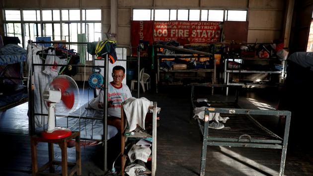 Firefighter Milan Miranda is set to retire next year after battling blazes for 32 years. He was inspired by his father and uncle to join the ranks, despite the dangers. “Every fire is a challenge, especially when we lack equipment like breathing apparatus so we inhale smoke and endure the heat, risking our health and lives,” Miranda said. “But this is the career given to me by God.” (Erik De Castro / REUTERS) Firefighter Milan Miranda is set to retire next year after battling blazes for 32 years. He was inspired by his father and uncle to join the ranks, despite the dangers. “Every fire is a challenge, especially when we lack equipment like breathing apparatus so we inhale smoke and endure the heat, risking our health and lives,” Miranda said. “But this is the career given to me by God.” (Erik De Castro / REUTERS)