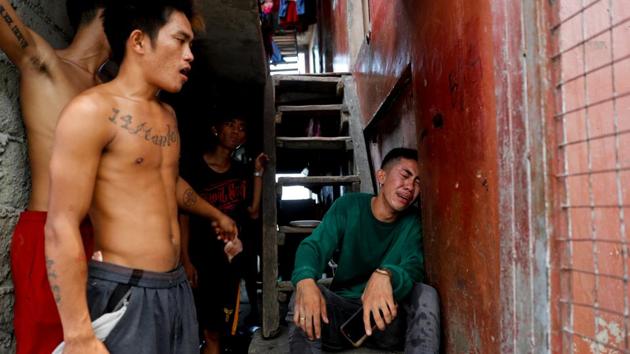 A man cries after his house was gutted in Muntinlupa, Metro Manila. Blazes quickly engulf shanty communities, said Pablo Sy, a pipe thread machine operator in Manila’s Santa Cruz district. “I was cooking and then we noticed the fire on our rooftop at the third floor. Everyone panicked,” he said, recalling the first fire he experienced. (Erik De Castro / REUTERS) A man cries after his house was gutted in Muntinlupa, Metro Manila. Blazes quickly engulf shanty communities, said Pablo Sy, a pipe thread machine operator in Manila’s Santa Cruz district. “I was cooking and then we noticed the fire on our rooftop at the third floor. Everyone panicked,” he said, recalling the first fire he experienced. (Erik De Castro / REUTERS)