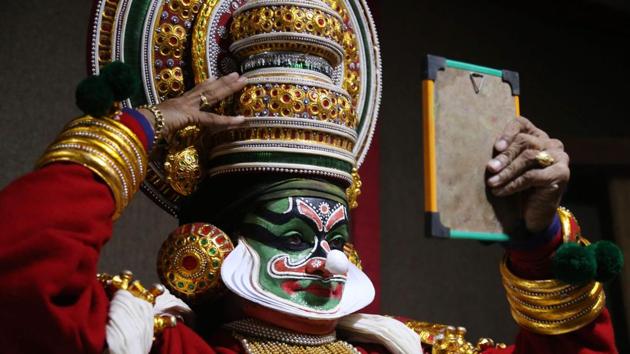 An artist from the Kathakali School Society of Thrissur prepares backstage for his performance in a programme organised by Madhya Pradesh Tribal Museum in Bhopal, Madhya Pradesh on June 18, 2018. (AFP) An artist from the Kathakali School Society of Thrissur prepares backstage for his performance in a programme organised by Madhya Pradesh Tribal Museum in Bhopal, Madhya Pradesh on June 18, 2018. (AFP)