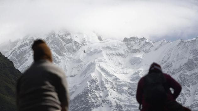 Devotees make their way to pay respects at the restored Kedarnath Temple that was hit by the deadly 2013 North India floods in Rudraprayag district of Uttarakhand on June 19, 2018. (Shammi Mehra / AFP) Devotees make their way to pay respects at the restored Kedarnath Temple that was hit by the deadly 2013 North India floods in Rudraprayag district of Uttarakhand on June 19, 2018. (Shammi Mehra / AFP)