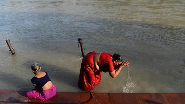 Devotees take a holy dip in the river Ganga in Rishikesh, Uttarakhand on June 18, 2018. (Sajjad Hussain / AFP) Devotees take a holy dip in the river Ganga in Rishikesh, Uttarakhand on June 18, 2018. (Sajjad Hussain / AFP)