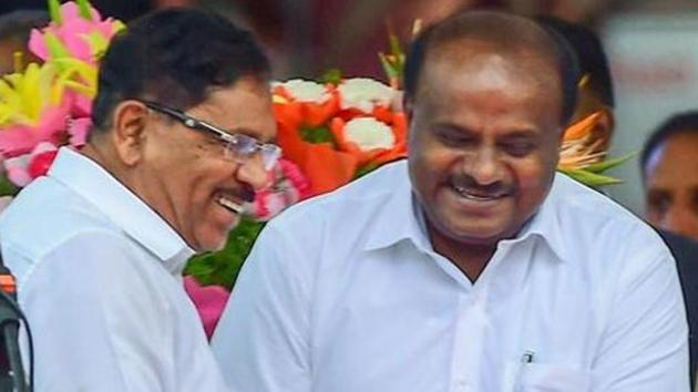 Karnataka chief minister Kumaraswamy greets his deputy G Parameshwara after the oath-taking ceremony in Bengaluru on May 23, 2018. (PTI Photo) Karnataka chief minister Kumaraswamy greets his deputy G Parameshwara after the oath-taking ceremony in Bengaluru on May 23, 2018. (PTI Photo)