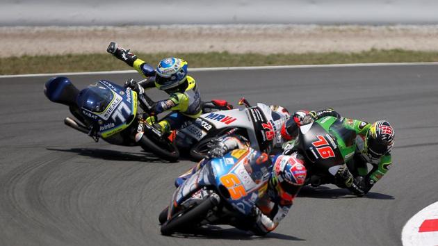Sudmetal Shedl GP Racing's Philipp Oettl, Angel Niece Team Moto3's Albert Arenas, CIP - Green Power’ Maker Yurchenko and Real Avintia Academy 77's Vicente Perez during moto 3 qualifying stages of the Grand Prix of Catalunya at the Circuit de Barcelona in Spain. (Jon Nazca / REUTERS)