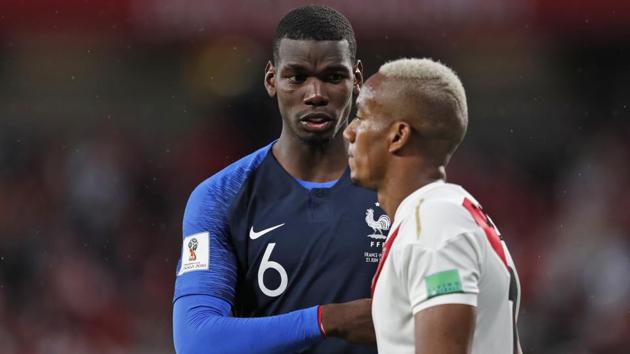 France's Paul Pogba comforts Peru's Luis Advincula at the end of the Group C match. (AP)