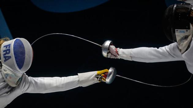 France's Mallo Auriane (L) challenges Zamachowska Aleksandra from Poland during the women's final of Epee competition at the European Fencing Championships in Novi Sad, Serbia. (Oliver Bunic / AFP)