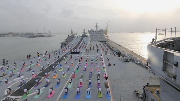 Indian Naval Cadets perform yoga on the deck of INS Virat to mark the fourth International Yoga Day in Mumbai, Maharashtra on June 21, 2018. (Bhushan Koyande / HT Photo) Indian Naval Cadets perform yoga on the deck of INS Virat to mark the fourth International Yoga Day in Mumbai, Maharashtra on June 21, 2018. (Bhushan Koyande / HT Photo)